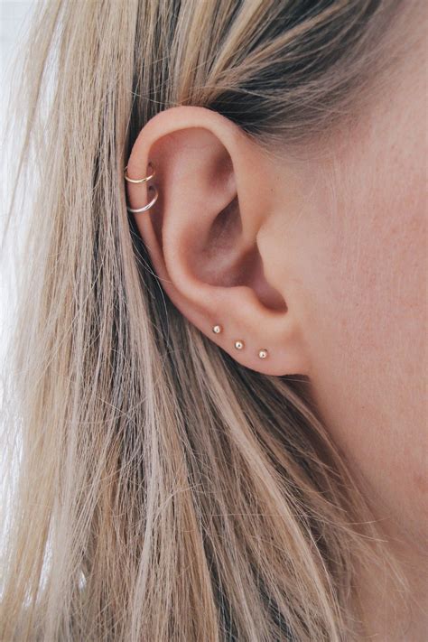 second stud earrings gold ring designs|second ear piercing ideas.